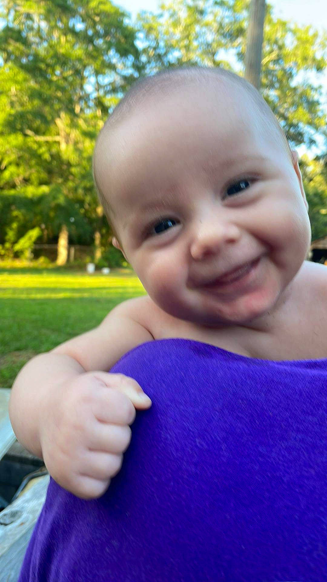 Jaxon joined the competition — help win amazing prizes! baby, baby_toddler_clothing, eye, facial_expression, finger, gesture, grass, green, happy, human_body, iris, joy, leisure, lip, people_in_nature, person, plant, skin, smile, sunlight