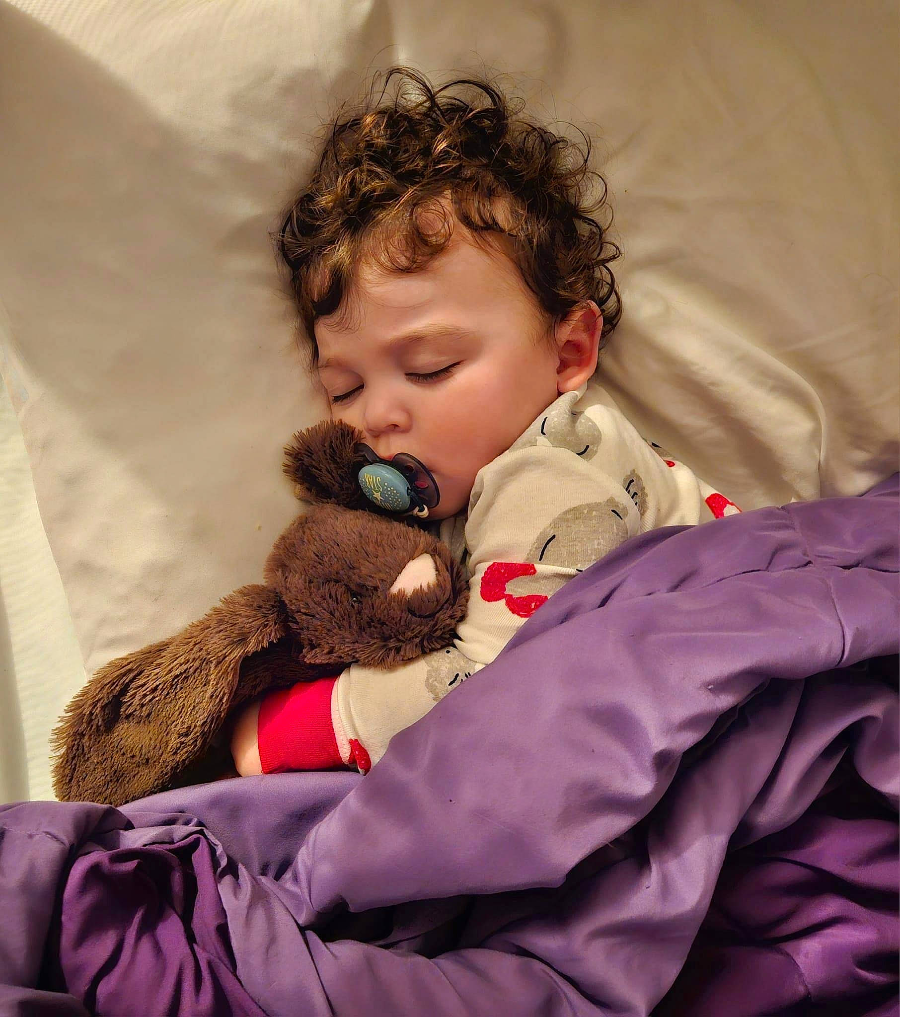 Isaac is registered to the contest to win money with this photo: baby, baby_products, baby_sleeping, baby_toddler_clothing, bedtime, cheek, child, comfort, eye, head, linens, mammal, mouth, nose, person, sitting, skin, sleeve, stuffed_toy, toddler