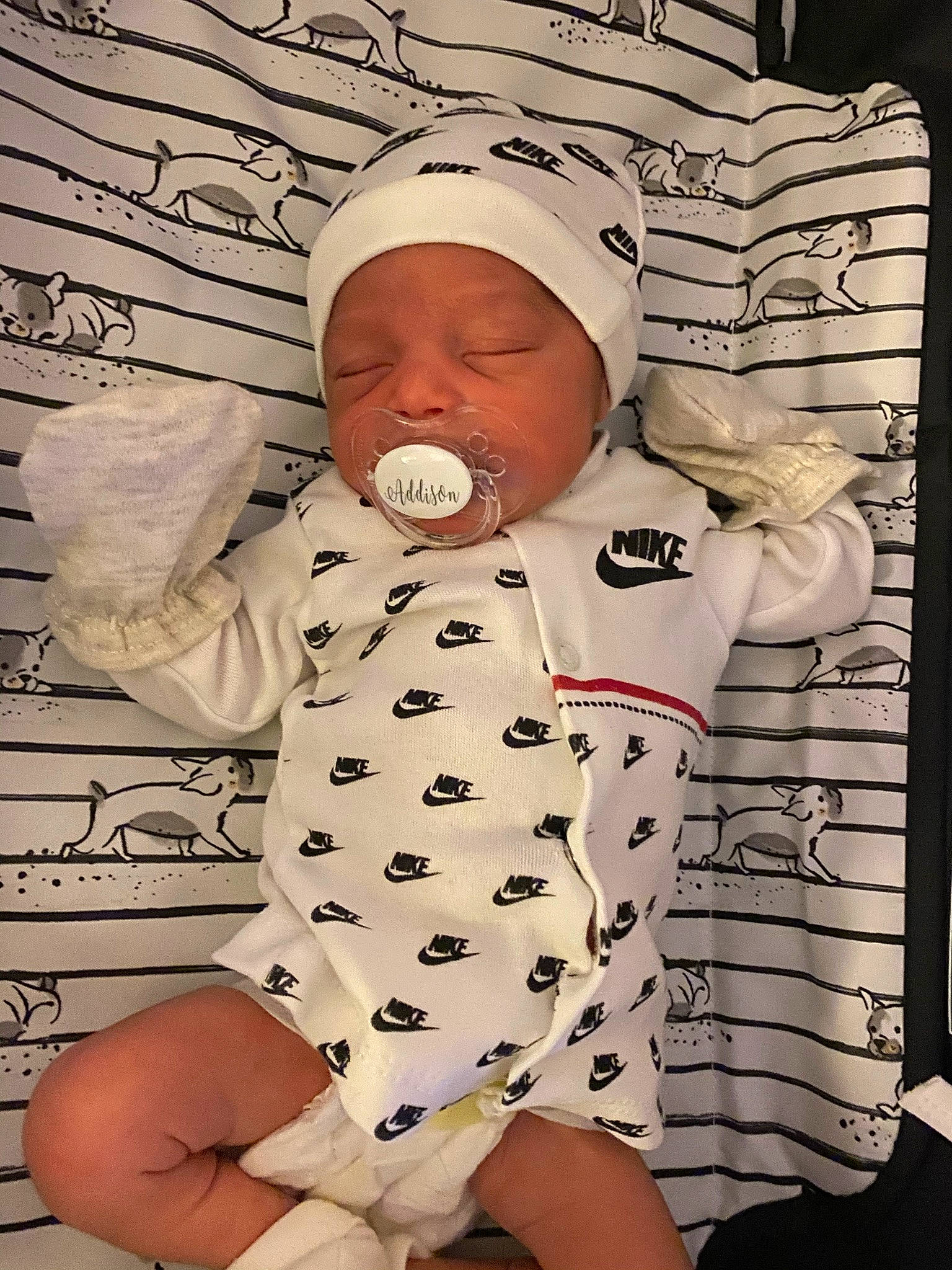 Addison is registered to the contest to win money with this photo: baby, baby_products, baby_safety, baby_sleeping, baby_toddler_clothing, child, comfort, face, finger, human_leg, linens, pattern, people, person, photograph, sleeve, textile, thigh, thumb, toddler