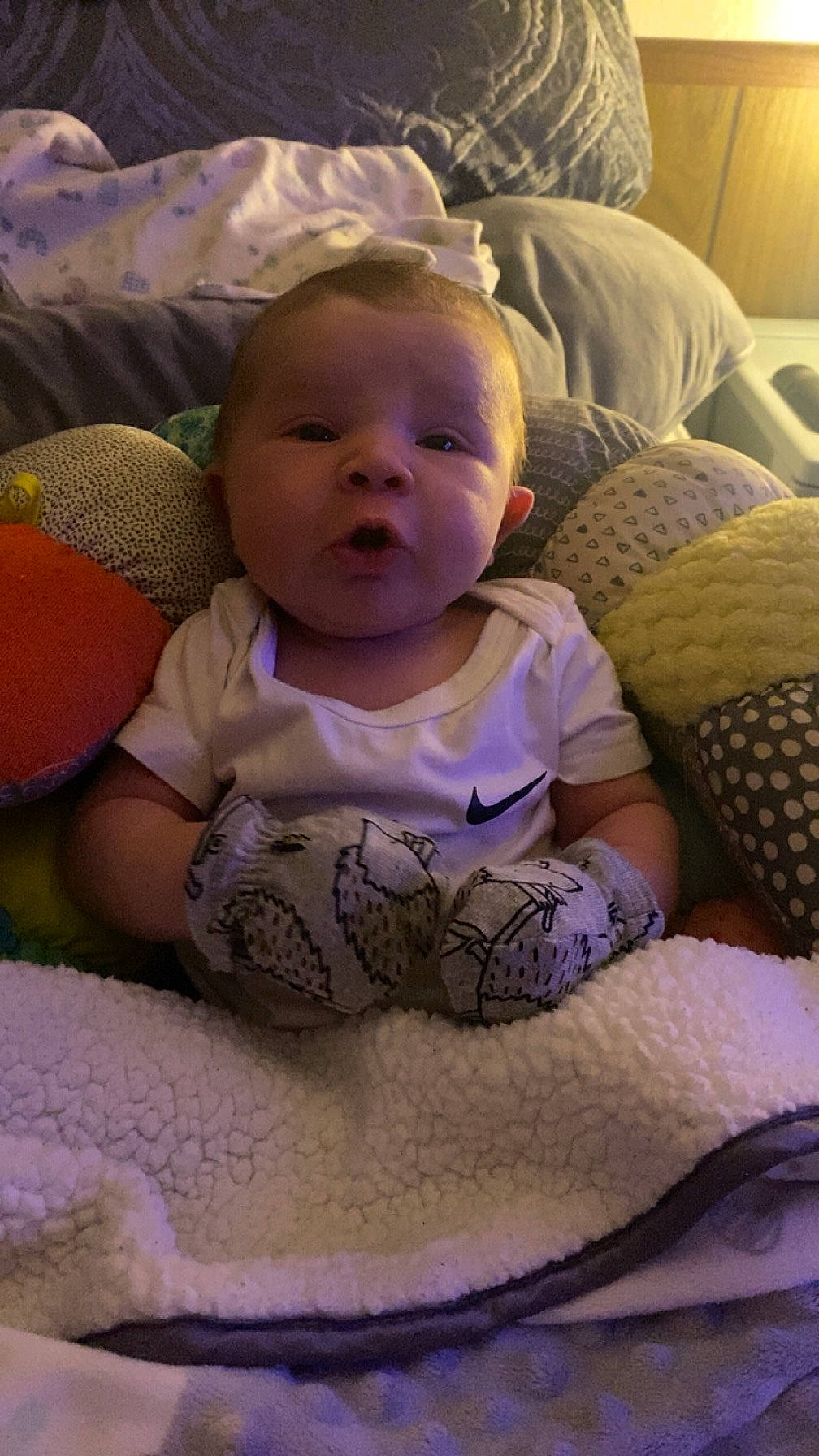 Kyson joined the competition — help win amazing prizes! baby, baby_toddler_clothing, cheek, child, comfort, couch, eye, finger, fun, happy, iris, linens, mouth, pattern, person, purple, room, sitting, skin, smile