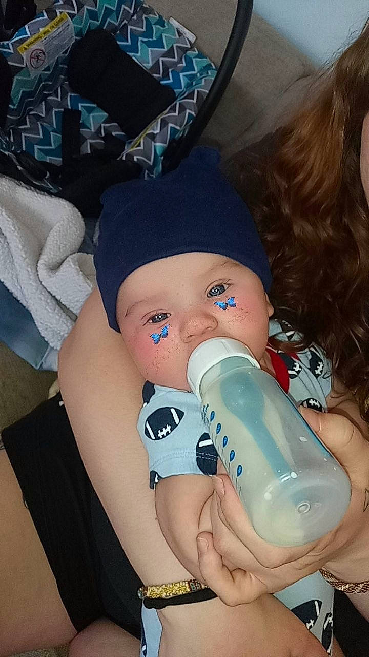 Kyson joined the competition — help win amazing prizes! baby, baby_products, baby_toddler_clothing, blue, bottle, cap, car_seat, drinking, drinkware, electric_blue, finger, hand, headwear, human_body, human_leg, nail, person, plastic_bottle, service, thigh