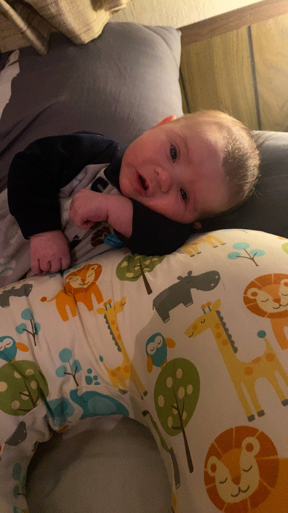 Kyson joined the competition — help win amazing prizes! baby, baby_toddler_clothing, bedding, cheek, child, comfort, eyebrow, facial_expression, finger, flooring, hairstyle, head, linens, mouth, neck, person, skin, sleeve, textile, toddler