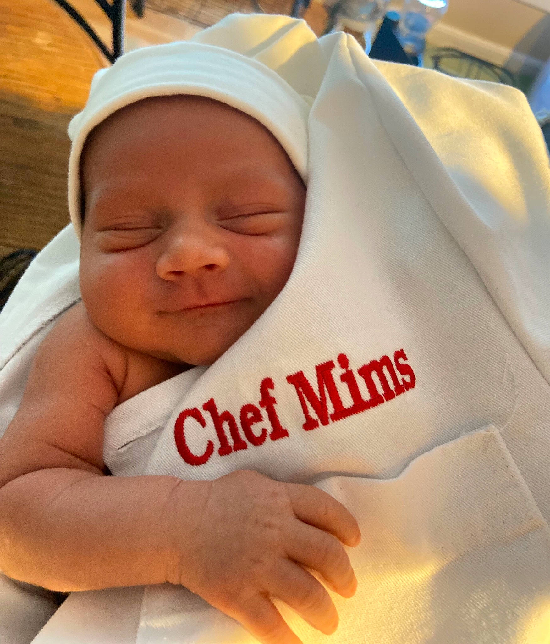 Lenox is registered to the contest to win money with this photo: baby, baby_products, baby_sleeping, baby_toddler_clothing, child, comfort, finger, fun, gesture, hand, happy, hat, linens, nail, person, product, room, skin, sleeve, thumb