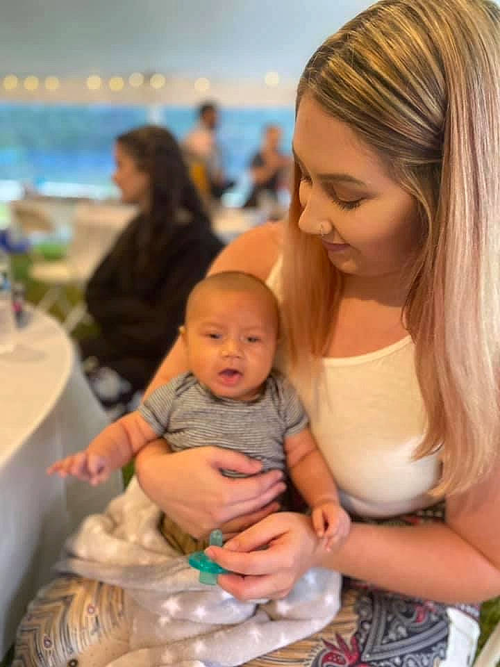 Lenox is registered to the contest to win money with this photo: baby, baby_toddler_clothing, beauty, cheek, event, eyelash, fun, happy, head, human, interaction, iris, jewellery, leisure, necklace, person, sitting, skin, smile, t_shirt