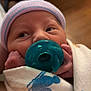 Maggie is registered to the contest to win money with this photo: newborn, baby, pacifier, blanket, hat, infant, wrapped, hospital, hand, face, skin, cute, closeup, person, sleepy, cozy, indoors, soft, toddler, child