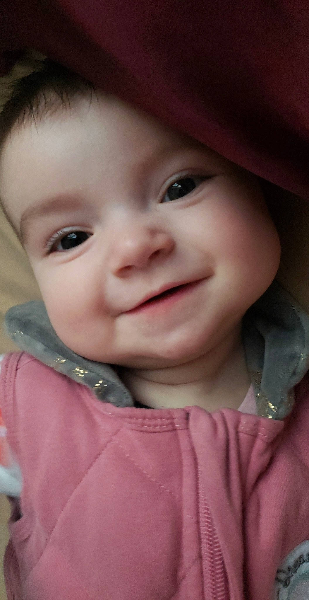 Luciana is registered to the contest to win money with this photo: baby, baby_toddler_clothing, cheek, chin, clothing, eye, eyebrow, face, happy, hat, iris, joy, lip, nose, outerwear, person, pink, skin, sleeve, smile