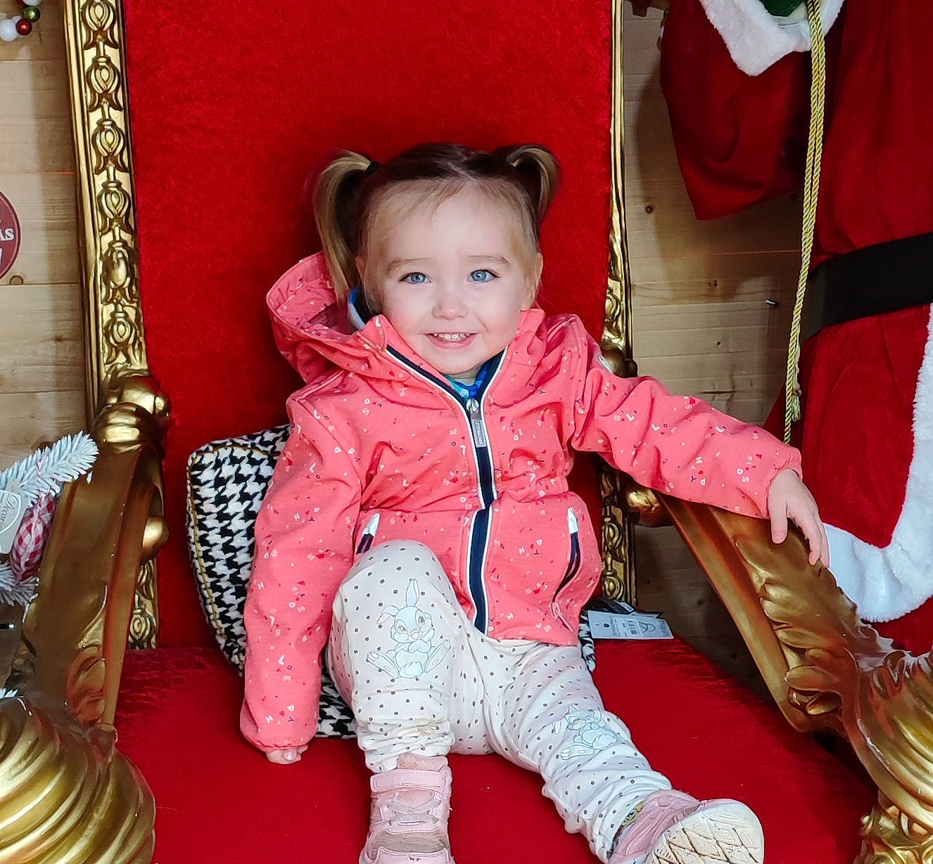 Rebecca participe au concours pour gagner de l'argent avec cette photo : baby_toddler_clothing, child, comfort, eye, facial_expression, flooring, fun, happy, human, human_body, joy, lap, leisure, outerwear, person, product, red, sleeve, smile, standing