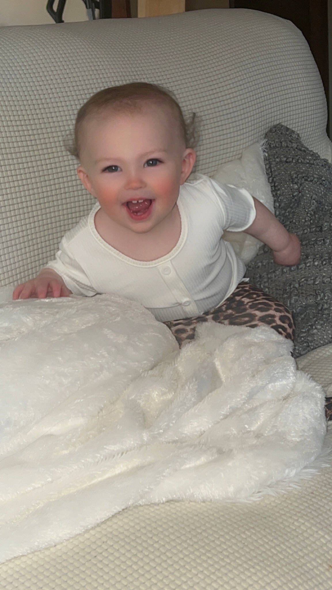 Jessica joined the competition — help win amazing prizes! baby, baby_products, baby_toddler_clothing, bedding, cheek, child, comfort, flash_photography, floor, flooring, happy, iris, joy, linens, person, room, sitting, skin, sleeve, smile