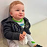 Xander joined the competition — help win amazing prizes! toddler, child, blue_eyes, hoodie, snack, sitting, white_pants, green_stripes, indoor, casual_clothing, shoes, cute, rosy_cheeks, light_wall, expression, holding, person, young_child, small_hand, comfortable