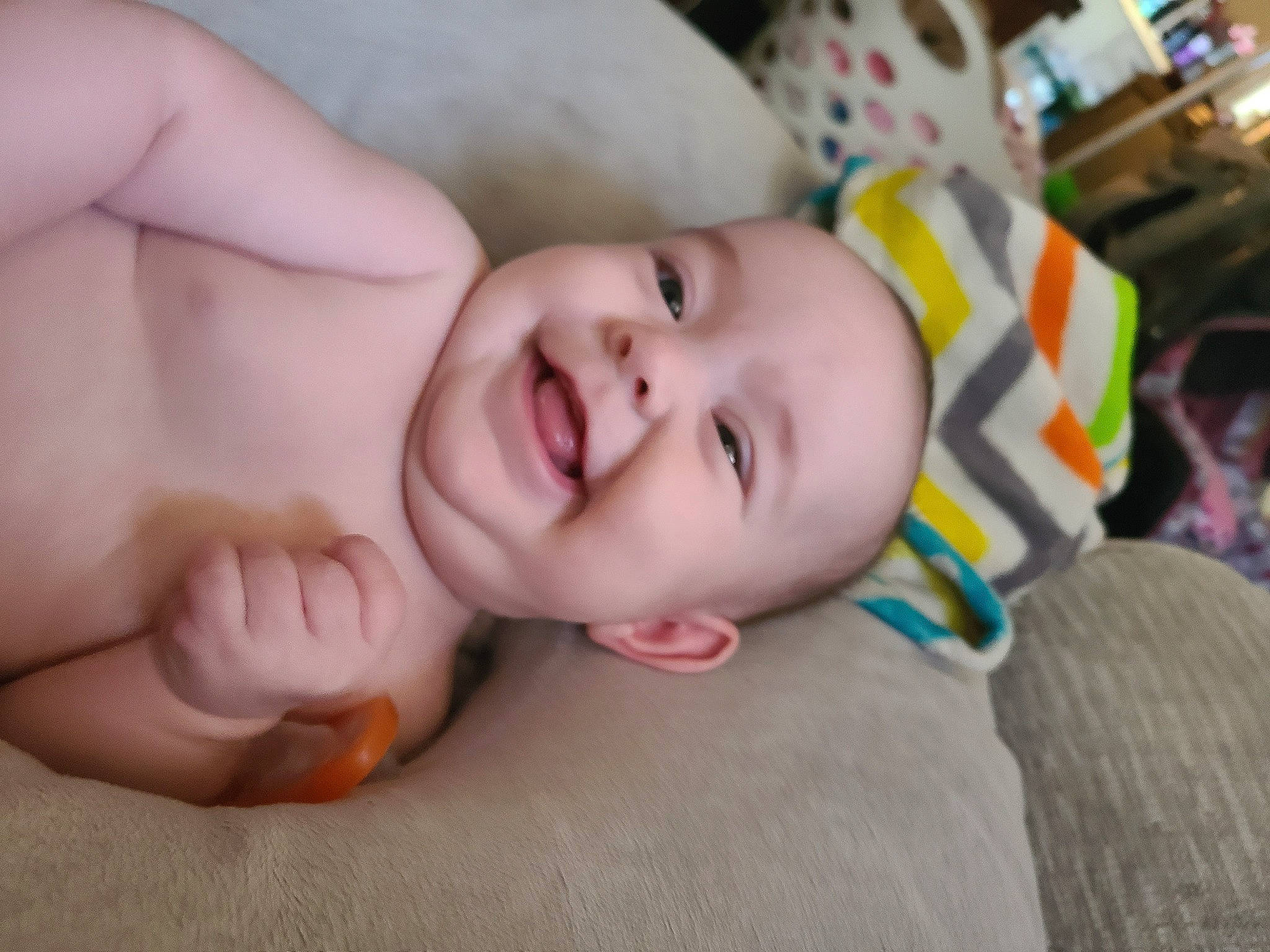 Sofia is registered to the contest to win money with this photo: baby, baby_toddler_clothing, cheek, child, comfort, eyebrow, flooring, fun, gesture, happy, iris, joy, lip, mouth, nail, nose, person, skin, smile, thumb