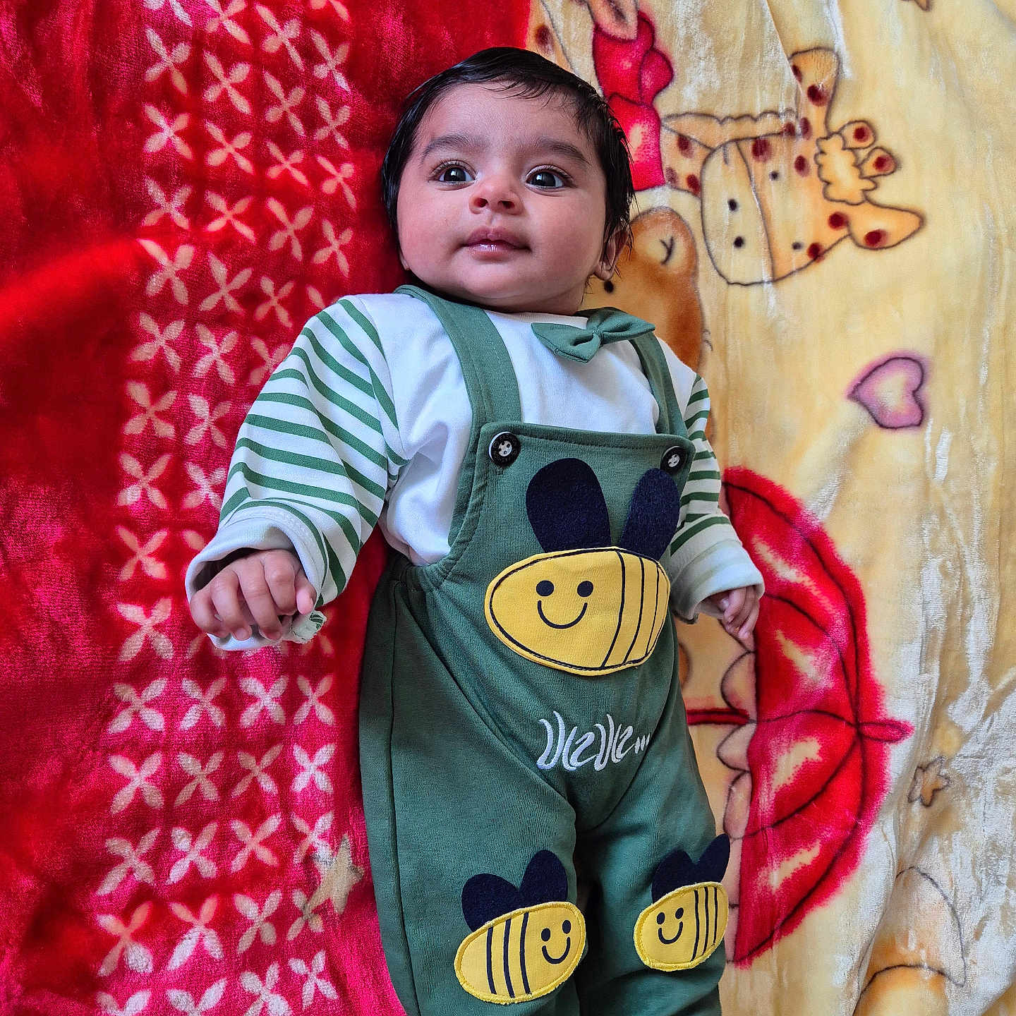 Harjas joined the competition — help win amazing prizes! applique, baby, blanket, bodypart, clothing, costume, dress, face, finger, hand, happy, hat, head, longsleeve, pants, pattern, person, photography, portrait, smile