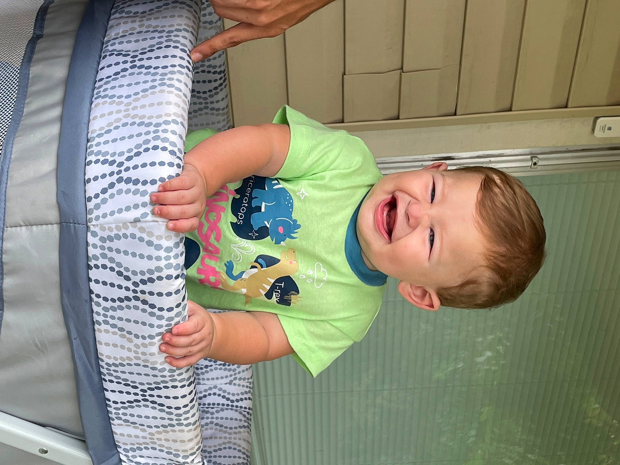 Ace is registered to the contest to win money with this photo: arm, baby, baby_toddler_clothing, child, comfort, elbow, finger, fun, hairstyle, hand, happy, head, joint, leisure, mammal, person, product, shoulder, sleeve, t_shirt