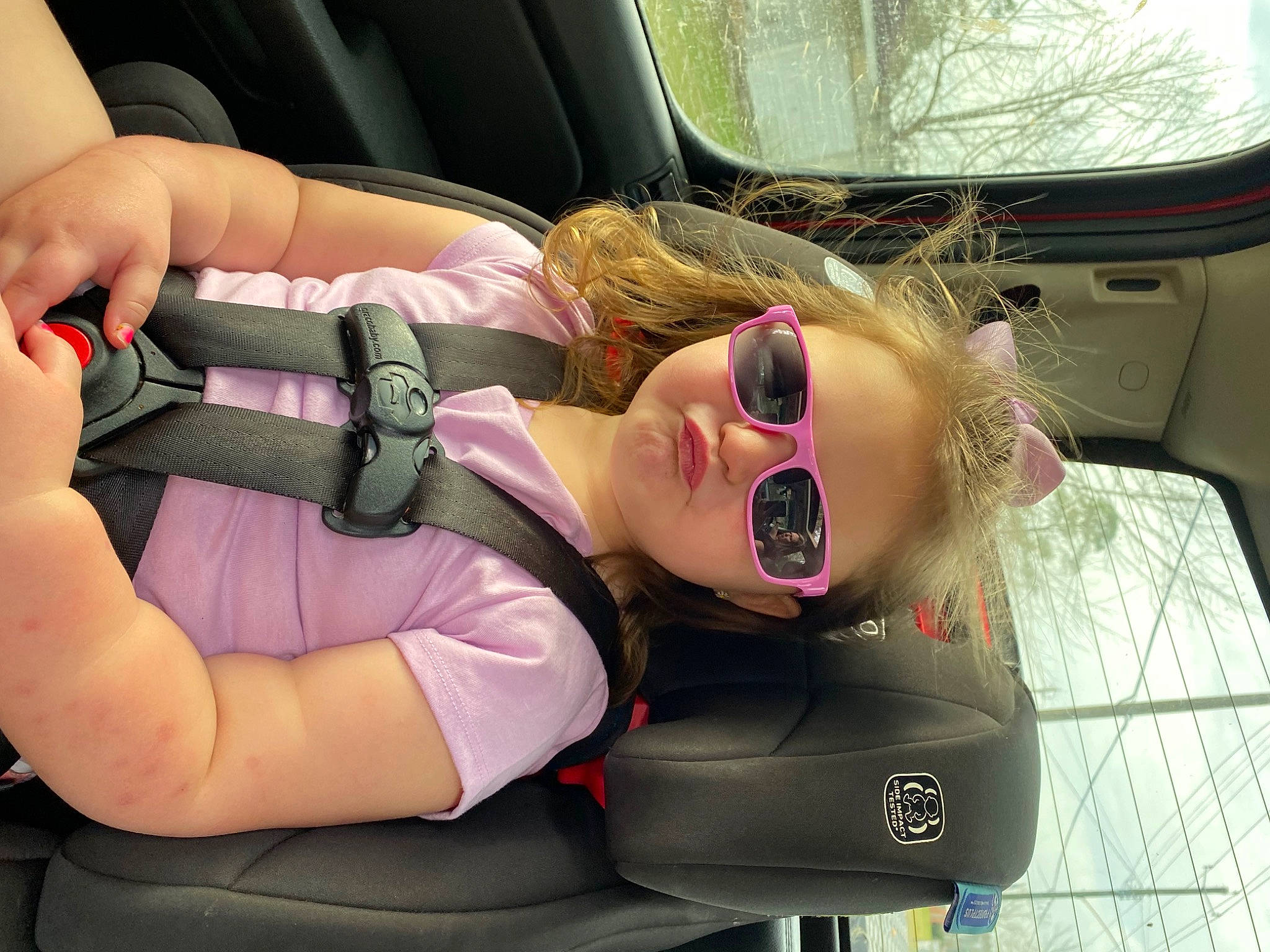 Paisleigh Yvonne is registered to the contest to win money with this photo: auto_part, automotive_design, automotive_exterior, car, car_seat, comfort, cool, eyewear, family_car, finger, fun, glasses, goggles, head_restraint, motor_vehicle, mouth, person, sunglasses, thigh, vehicle_door