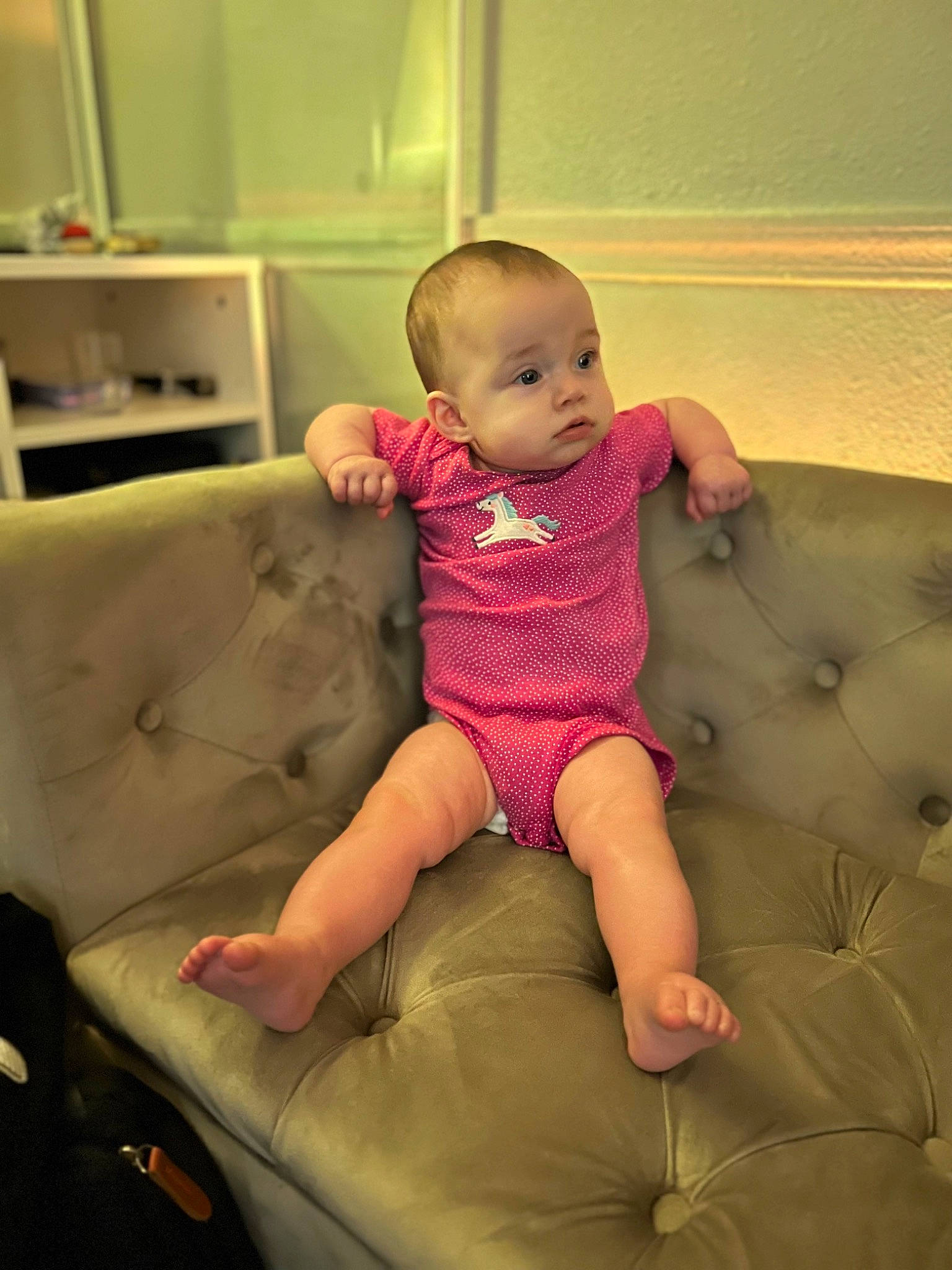 Evelynn joined the competition — help win amazing prizes! arm, baby, baby_toddler_clothing, cheek, comfort, couch, eye, finger, flooring, hand, human_leg, knee, leg, person, room, sitting, skin, sleeve, sock, thigh