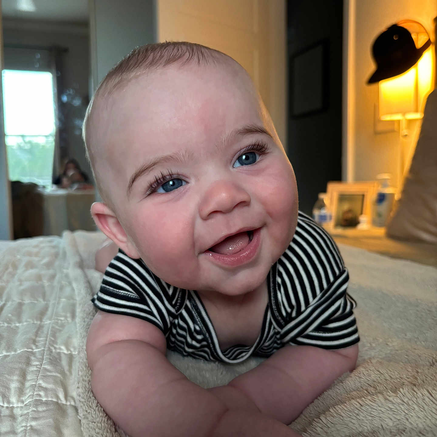 Elijah joined the competition — help win amazing prizes! baby, babylaughing, bed, bedroom, bodypart, couch, crawling, face, finger, furniture, hand, happy, head, indoors, laughing, person, photography, portrait, room, smile