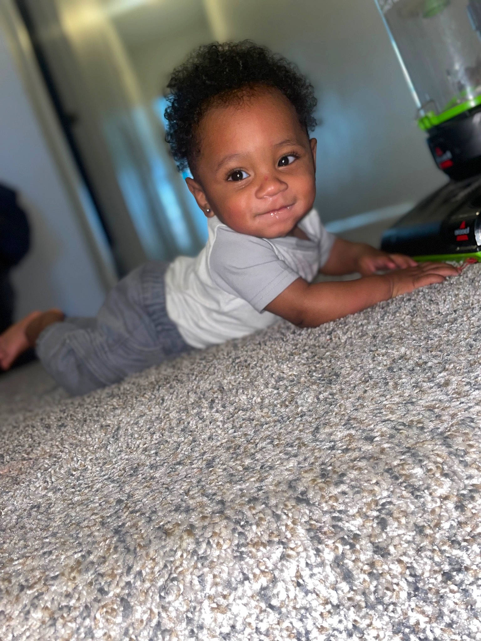 Ja'Cari joined the competition — help win amazing prizes! baby, baby_toddler_clothing, carpet, cheek, child, comfort, crawling, flash_photography, floor, flooring, fun, hardwood, home_appliance, iris, kitchen_appliance, person, road_surface, sitting, smile, toddler