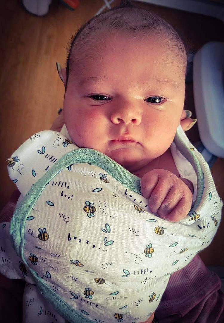 Karson is registered to the contest to win money with this photo: baby, baby_toddler_clothing, cheek, chin, comfort, eyebrow, eyelash, finger, forehead, gesture, happy, iris, lip, mouth, neck, nose, organ, person, skin, sleeve