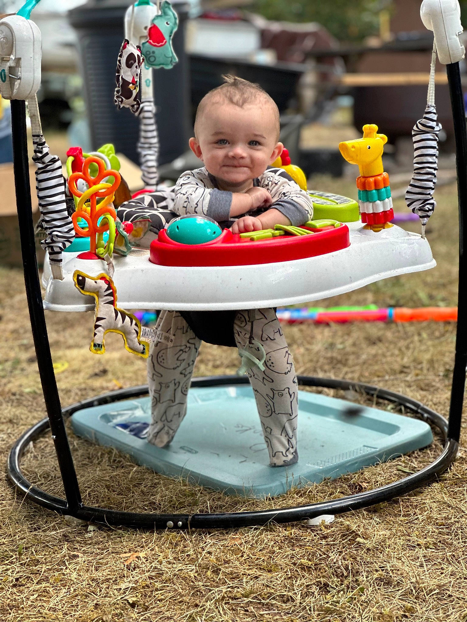 Karson is registered to the contest to win money with this photo: baby, baby_products, baby_toddler_clothing, baby_toys, child, city, fun, grass, happy, joy, leisure, outdoor_play_equipment, person, play, playground, recreation, sitting, smile, swing, toddler