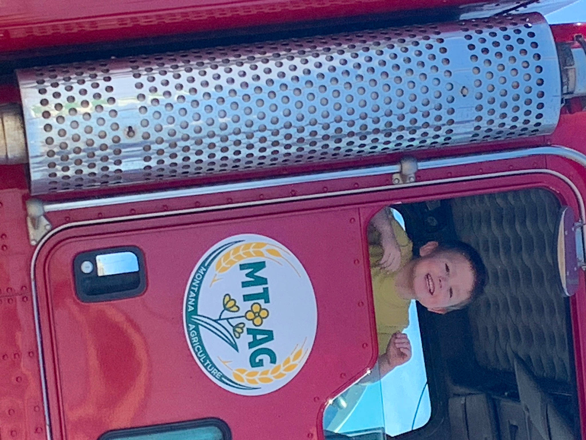 Conner is registered to the contest to win money with this photo: auto_part, automotive_design, automotive_exterior, automotive_lighting, automotive_tail_brake_light, automotive_wheel_system, bumper, electric_blue, gas, grille, headlamp, hood, joy, mode_of_transport, motor_vehicle, person, pink, red, snapshot, technology