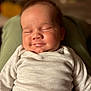 Puku joined the competition — help win amazing prizes! baby, infant, sleeping, smile, face, clothing, white, cozy, portrait, closeup, child, peaceful, resting, soft_focus, indoor, cute, person, newborn, happy, relaxed