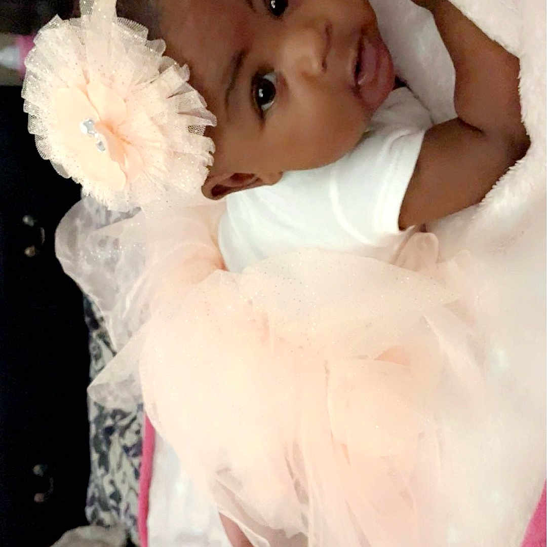 Eryn joined the competition — help win amazing prizes! accessories, baby, bed, blanket, bonnet, clothing, costume, dress, earring, face, furniture, hat, head, indoors, jewelry, newborn, person, photography, portrait, sleeping