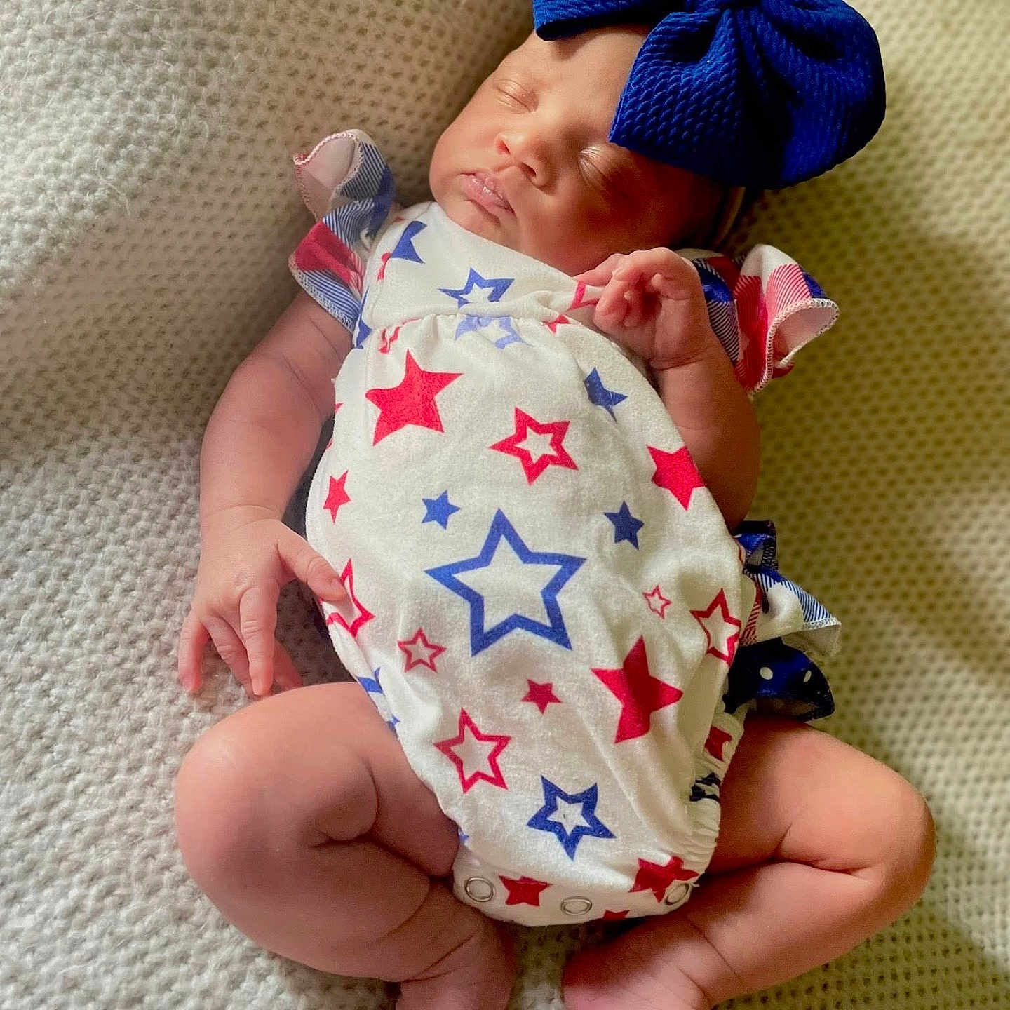 Khalynne joined the competition — help win amazing prizes! baby, blanket, blue_bow, child, cute, face, hands, headwear, indoors, infant, legs, newborn, onesie, peaceful, portrait, relaxing, skin, sleeping, soft_texture, star_pattern