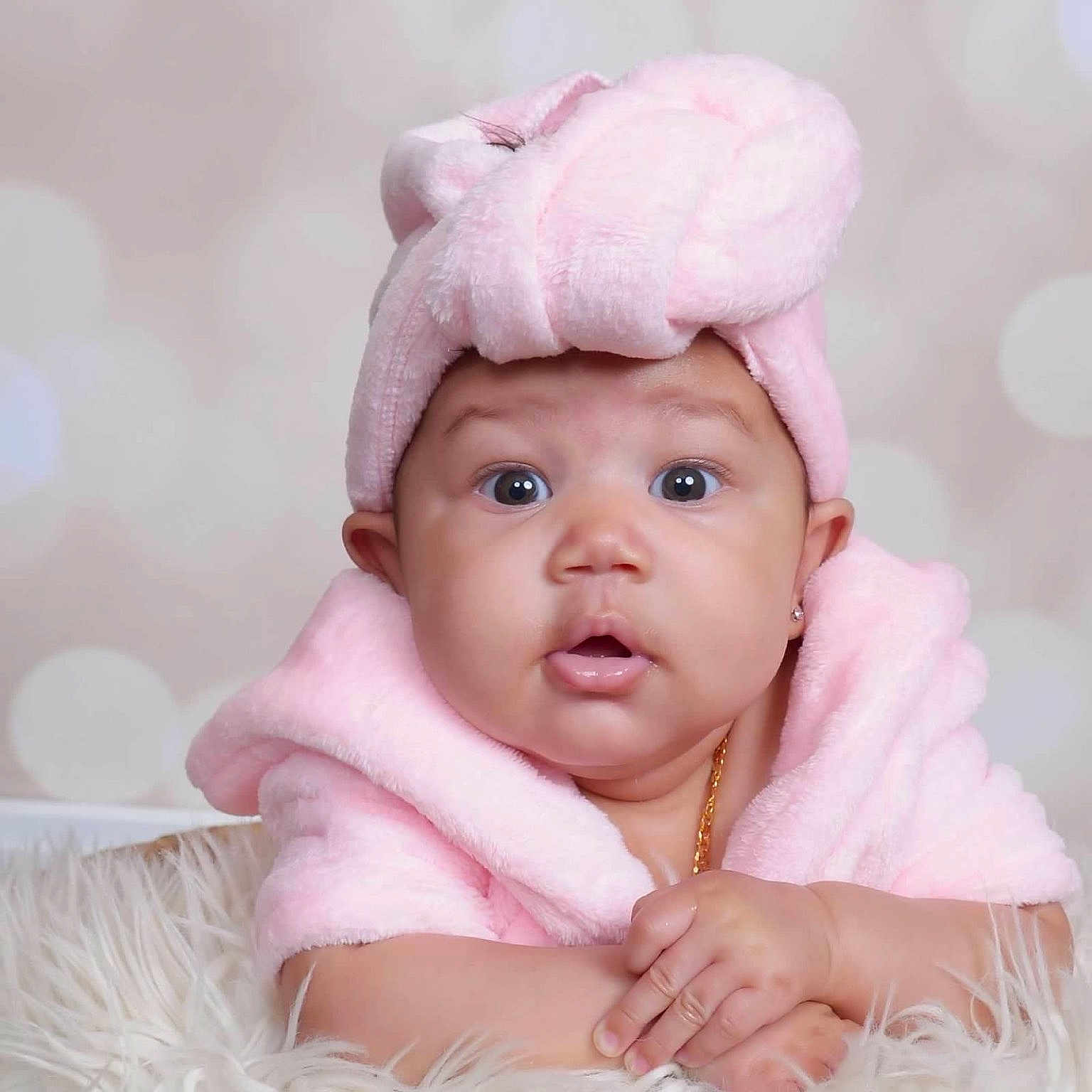 Kamaya joined the competition — help win amazing prizes! baby, blanket, bodypart, bonnet, cap, clothing, face, finger, hand, happy, hat, head, newborn, person, photography, portrait, sad, smile, towel