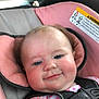 Paisley joined the competition — help win amazing prizes! baby, car_seat, child, infant, smile, blue_eyes, pink, seatbelt, clothing, car_interior, window, headrest, face, harness, safety, cute, closeup, cheeks, person, daylight
