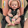 baby, car_seat, bottle, mittens, pink, blue_eyes, floor, person, infant, seatbelt, wooden_floor, clothing, cute, bottle_nipple, child, baby_bottle, sitting, indoors, face, portrait