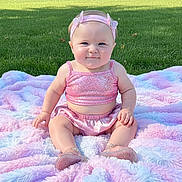 Paisley joined the competition — help win amazing prizes! baby, blanket, butterfly, child, cute, footwear, grass, greenery, happy, headband, infant, nature, outdoor, park, pink_clothing, sitting, smile, soft_texture, sparkly, sunlight