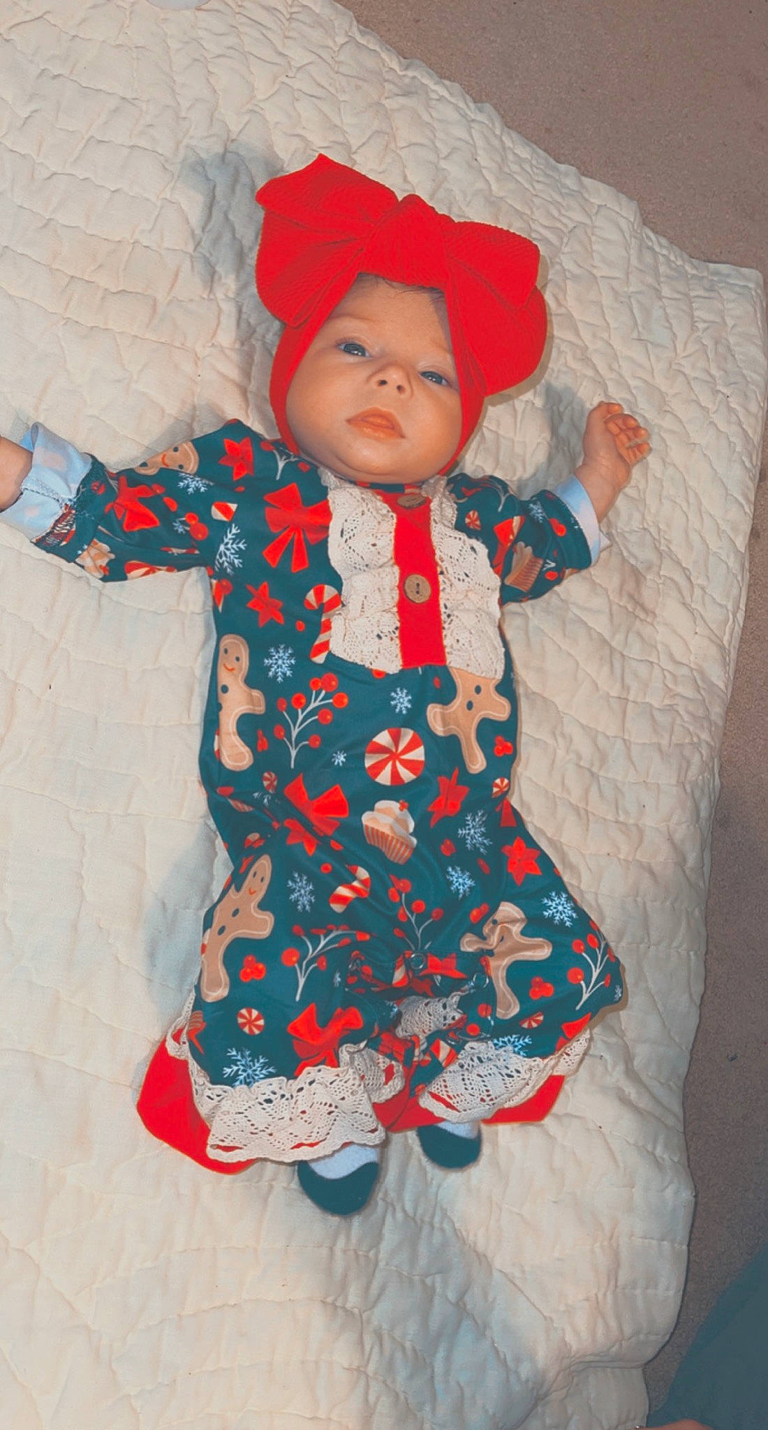 Maislyn is registered to the contest to win money with this photo: art, azure, baby_toddler_clothing, cheek, child, doll, eye, face, head, headgear, headwear, orange, outerwear, pattern, person, sleeve, sock, stuffed_toy, textile, toddler