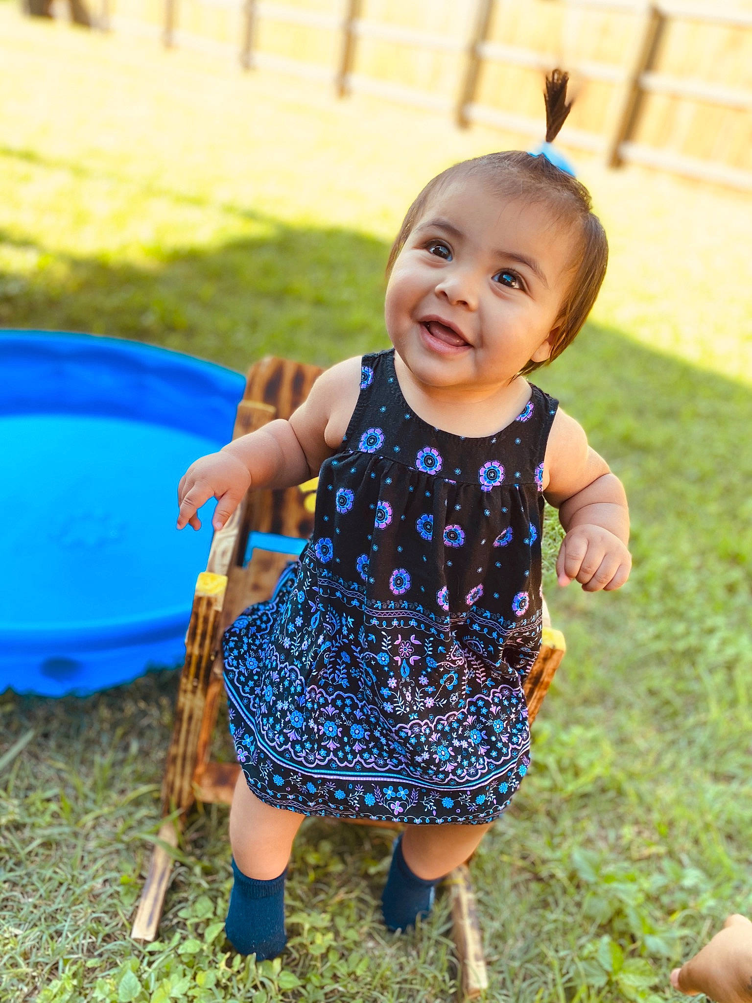 Joanna is registered to the contest to win money with this photo: baby, baby_toddler_clothing, child, design, dress, facial_expression, fun, grass, happy, joy, pattern, people, person, plant, play, skin, smile, summer, toddler, vacation