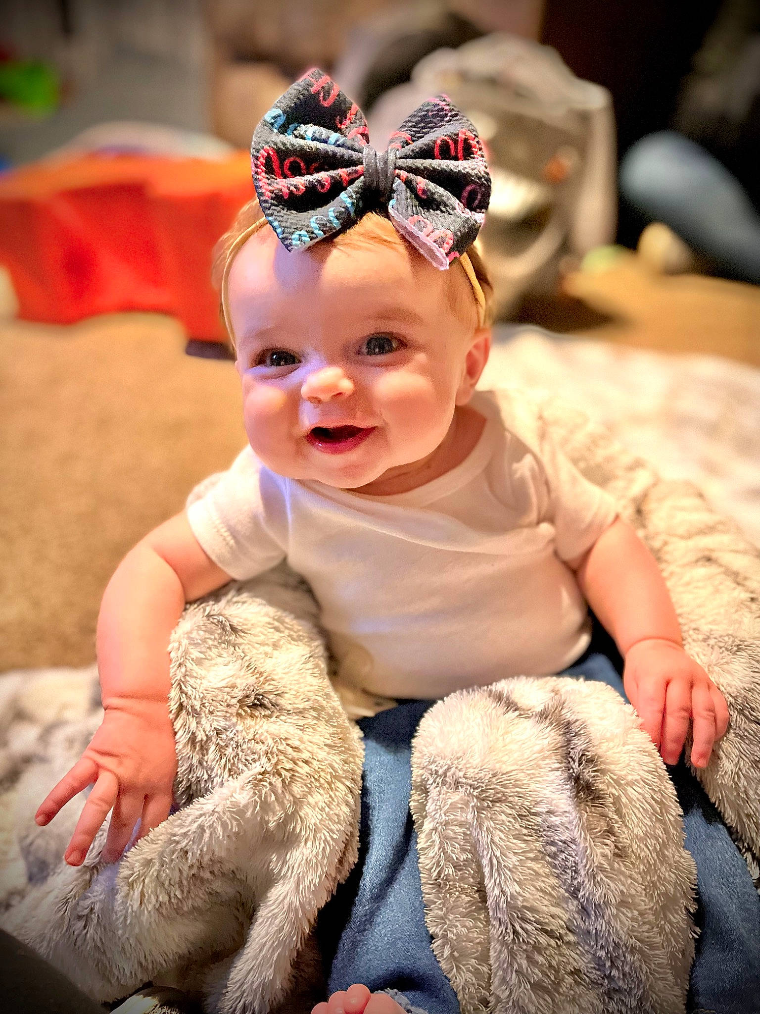 Braeleigh is registered to the contest to win money with this photo: baby, baby_toddler_clothing, cap, child, event, eyewear, finger, fun, fur, grass, happy, hat, headband, headpiece, headwear, mammal, person, photograph, sitting, skin