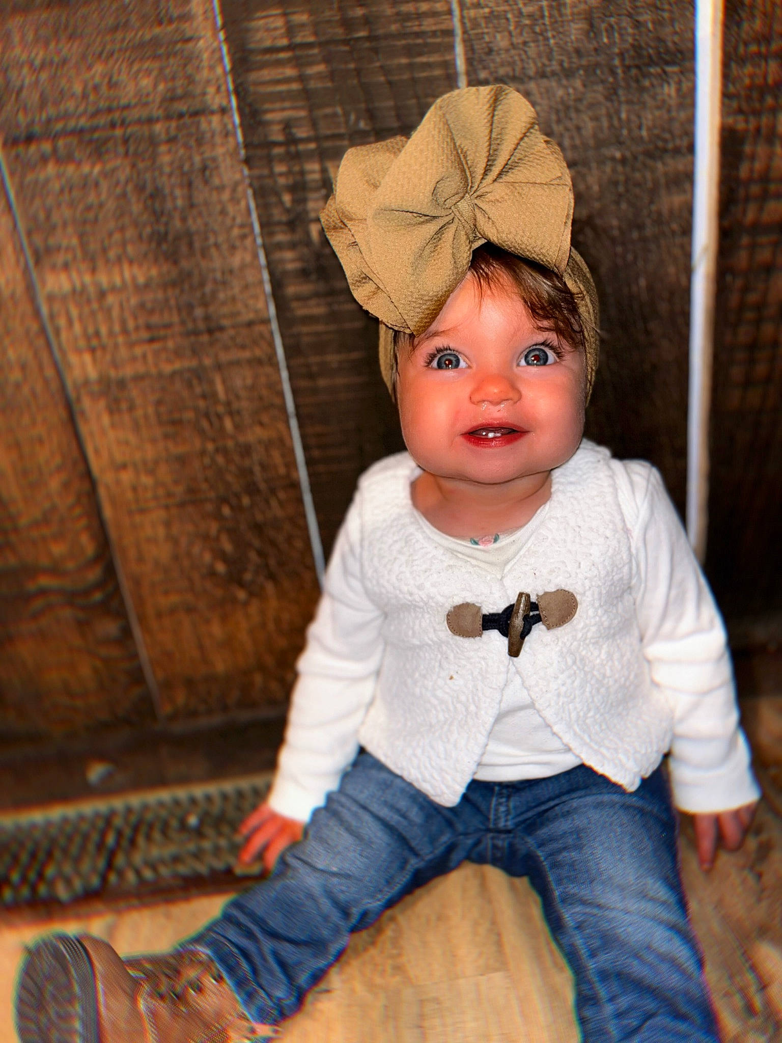 Braeleigh joined the competition — help win amazing prizes! baby, baby_toddler_clothing, cap, cheek, child, clothing, costume_hat, eye, face, fashion_accessory, head, headgear, knit_cap, lip, person, skin, sleeve, toddler, toy, wood