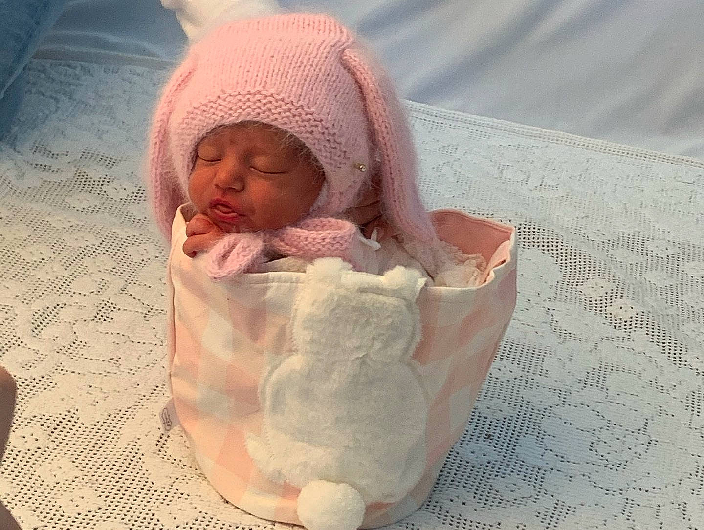 Beatrice is registered to the contest to win money with this photo: baby, baby_products, baby_safety, baby_sleeping, baby_toddler_clothing, bedding, bedtime, cap, cheek, child, comfort, flesh, foot, headwear, knit_cap, linens, person, sleep, sleeve, textile