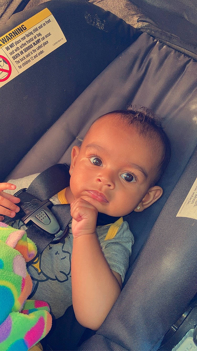 Enchanted is registered to the contest to win money with this photo: baby, baby_toddler_clothing, cheek, cool, eye, eyebrow, eyelash, finger, flash_photography, forehead, hairstyle, head, iris, lip, mouth, nose, organ, person, product, skin