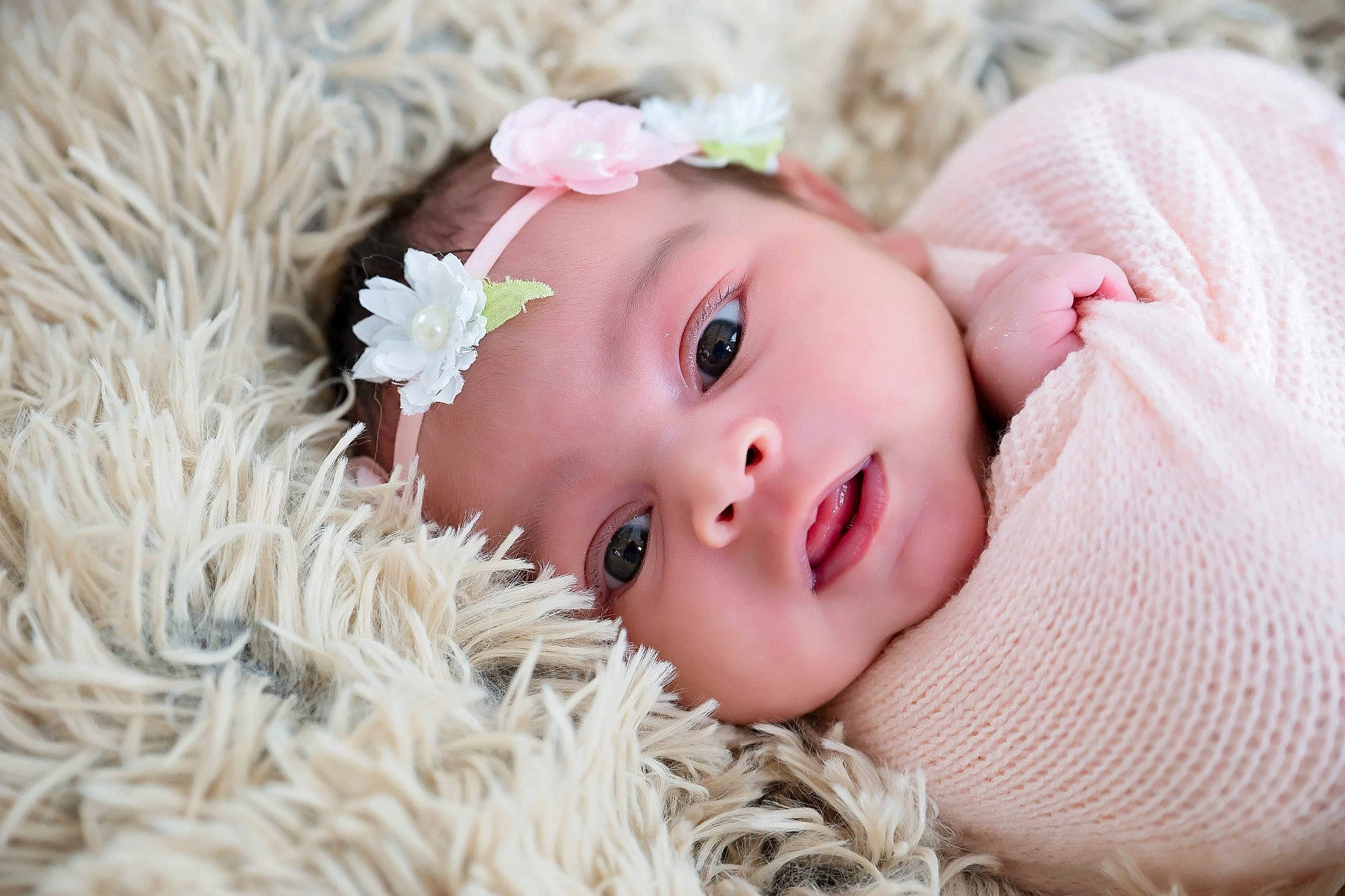 Enchanted joined the competition — help win amazing prizes! baby, baby_toddler_clothing, cheek, child, eye, eyelash, face, flash_photography, grass, happy, head, headgear, headwear, iris, lip, person, petal, pink, skin, textile