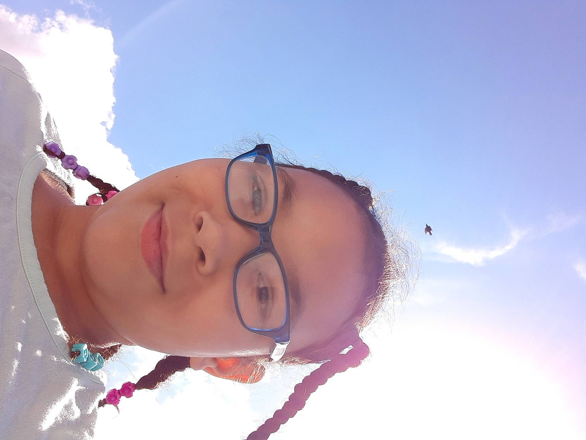 Kiya is registered to the contest to win money with this photo: baby, cheek, child, cool, eye, eyewear, face, facial_expression, forehead, fun, head, joy, lip, mouth, nose, person, pink, skin, sky, smile