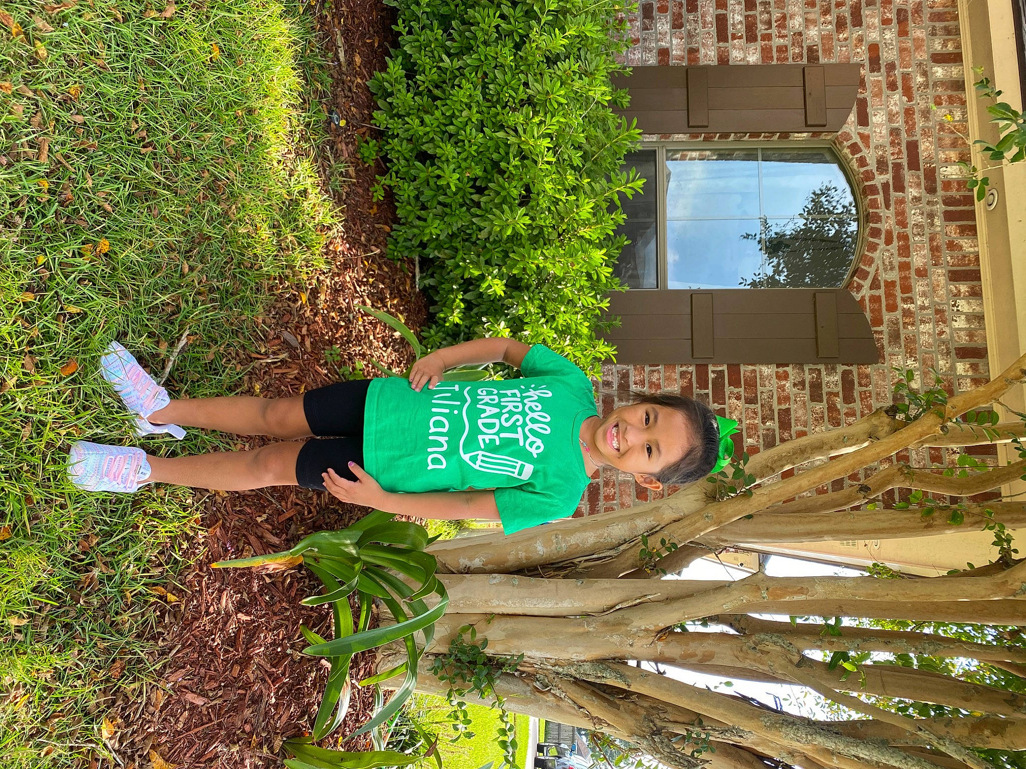 Juliana is registered to the contest to win money with this photo: adaptation, botany, fun, grass, groundcover, human_leg, joy, leaf, leisure, people_in_nature, person, plant, shorts, shrub, spring, t_shirt, thigh, toddler, tree, vegetation