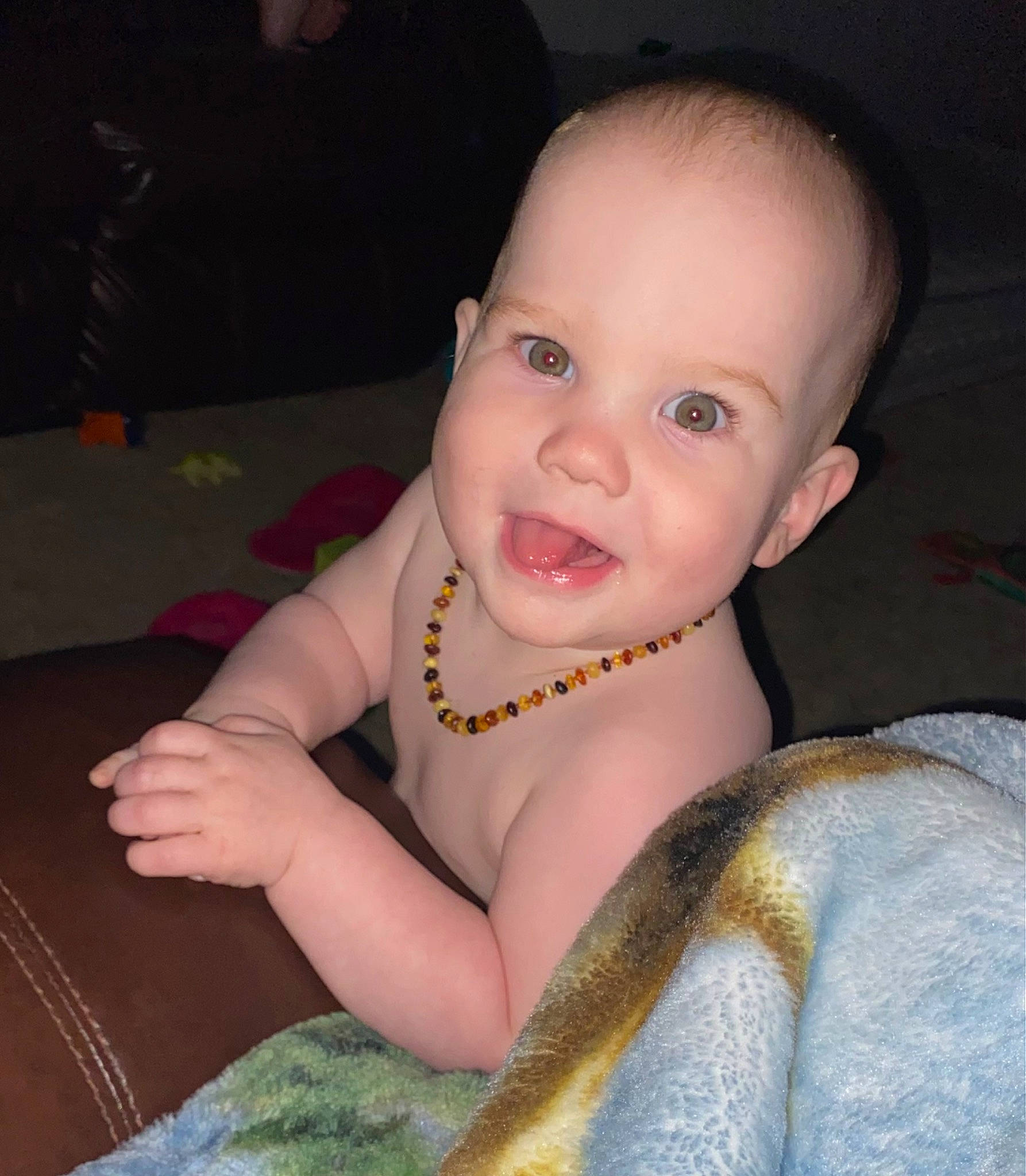 Jensen is registered to the contest to win money with this photo: baby, baby_toddler_clothing, cheek, chest, chin, dress, ear, eyebrow, eyelash, flash_photography, happy, human_body, iris, lip, nose, person, skin, sleeve, smile, toddler