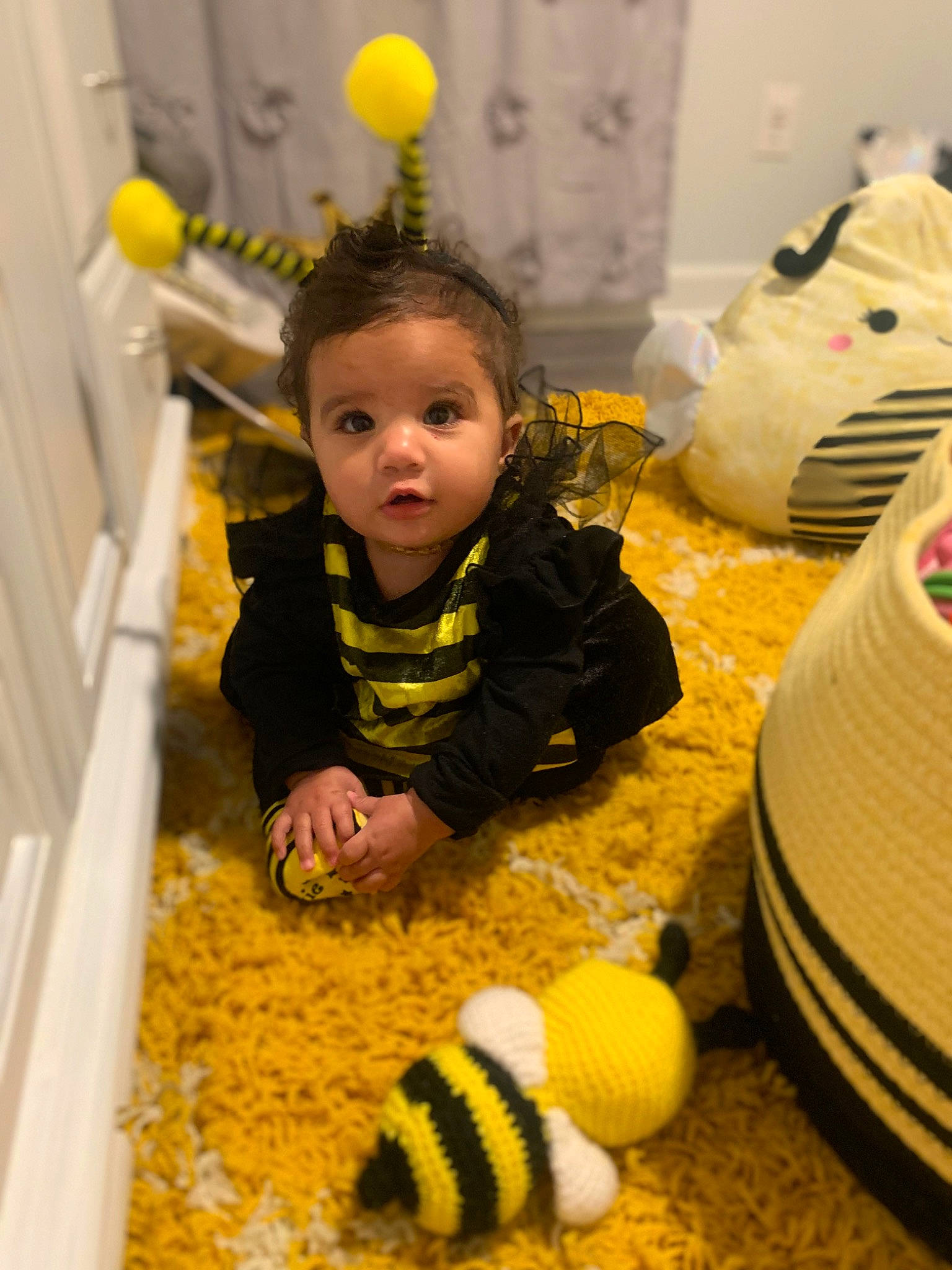 Amelia is registered to the contest to win money with this photo: baby, baby_toddler_clothing, baby_toys, ball, cap, child, design, eye, flooring, fun, people, person, play, product, room, snapshot, stuffed_toy, toddler, toy, woolen