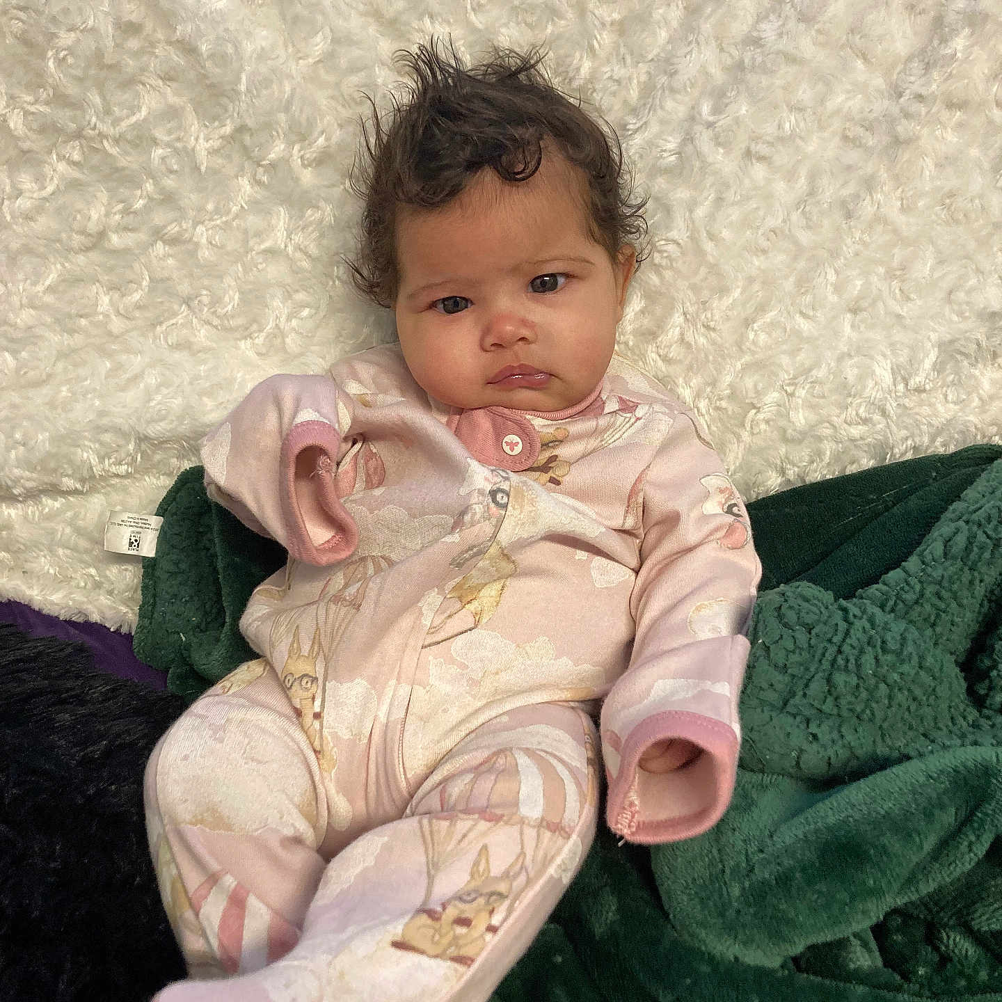 Kashlynn is registered to the contest to win money with this photo: baby, blanket, bodypart, clothing, couch, dress, face, fashion, finger, formalwear, furniture, gown, hand, head, pants, person, photography, portrait, quilt, sitting