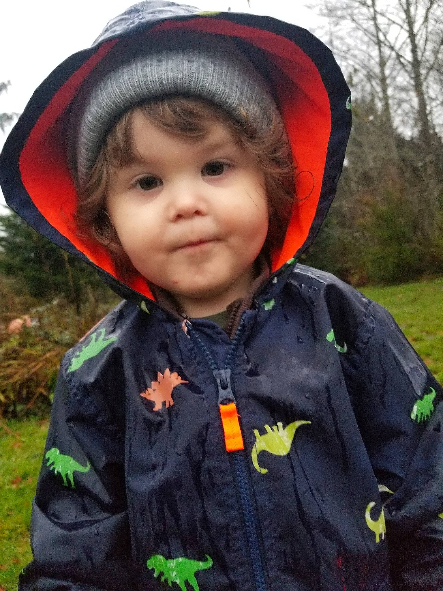 Tanner is registered to the contest to win money with this photo: child, hat, headgear, headwear, jacket, outerwear, person, personal_protective_equipment, smile, toddler