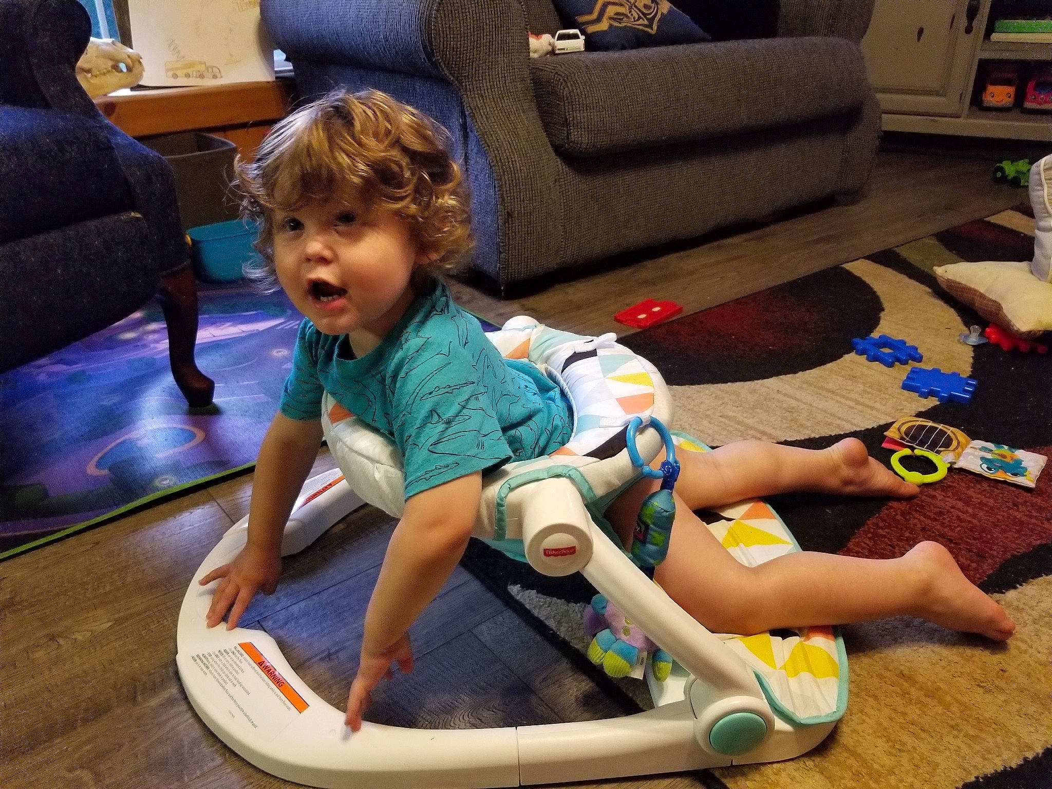 Tanner joined the competition — help win amazing prizes! baby, chair, child, floor, flooring, fun, games, person, play, sitting, toddler, toy