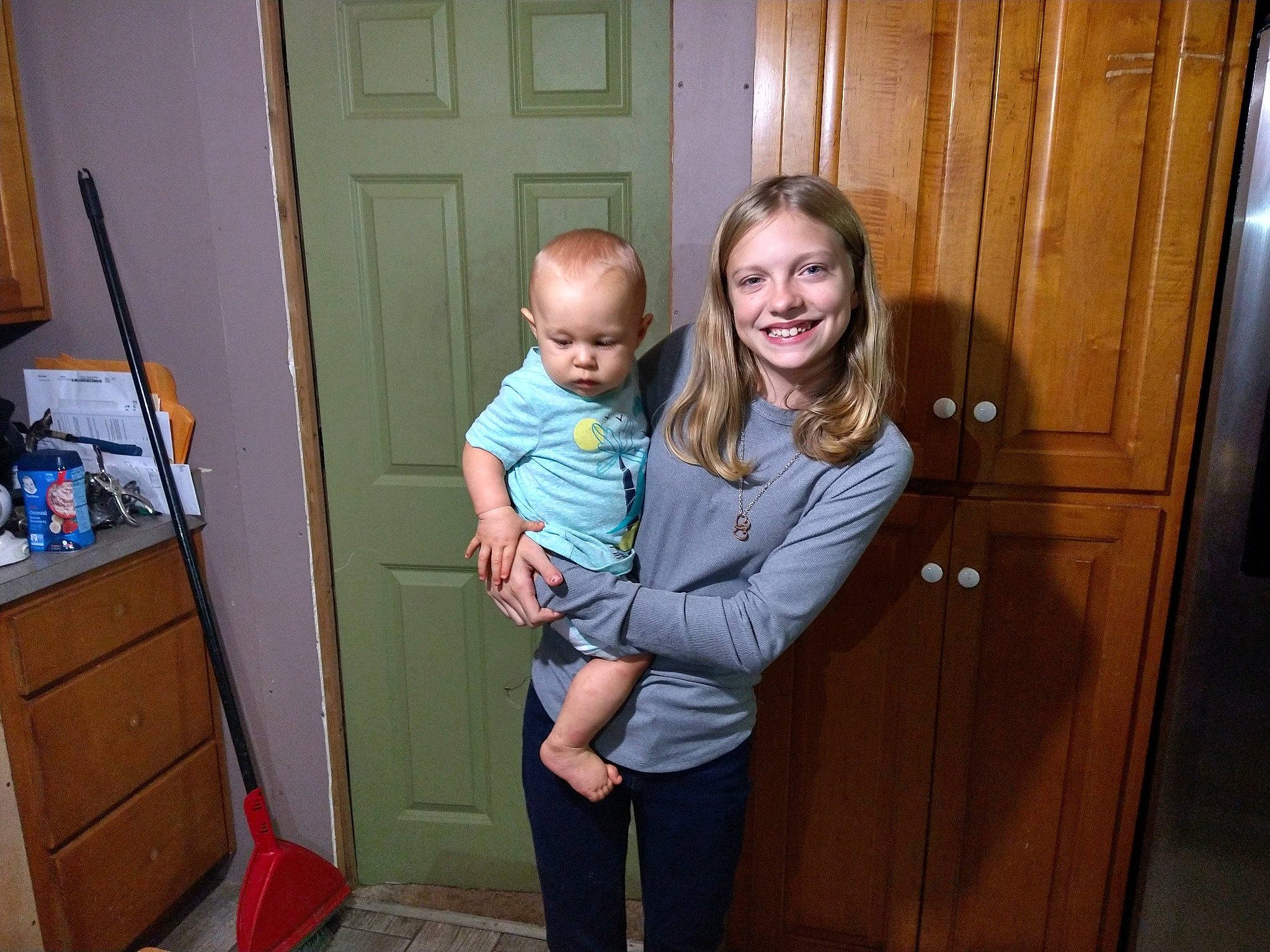 Tiffany Logan is registered to the contest to win money with this photo: child, door, fun, joy, person, room, shoulder, smile, standing, toddler