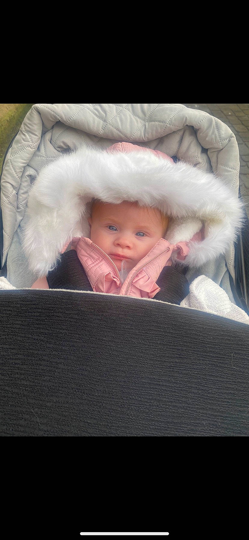 Cassie joined the competition — help win amazing prizes! baby, baby_carriage, baby_products, baby_safety, baby_sleeping, baby_toddler_clothing, cheek, child, comfort, eye, fashion_accessory, fur, fur_clothing, happy, headwear, linens, person, sitting, smile, toddler