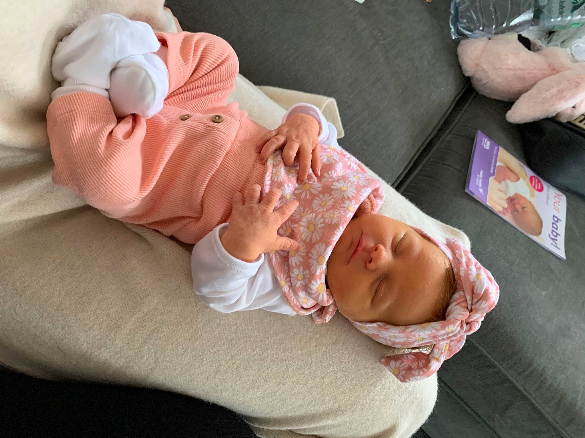 Cassie joined the competition — help win amazing prizes! baby, baby_products, baby_sleeping, baby_toddler_clothing, cheek, child, comfort, event, finger, glasses, hat, linens, mouth, nail, person, pink, room, sitting, skin, sleeve