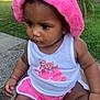 toddler, child, pink_towel, pink_shorts, white_tank_top, outdoor, greenery, grass, sidewalk, sitting, person, baby, cute, summer, sunlight, casual, portrait, expression, skin, earrings
