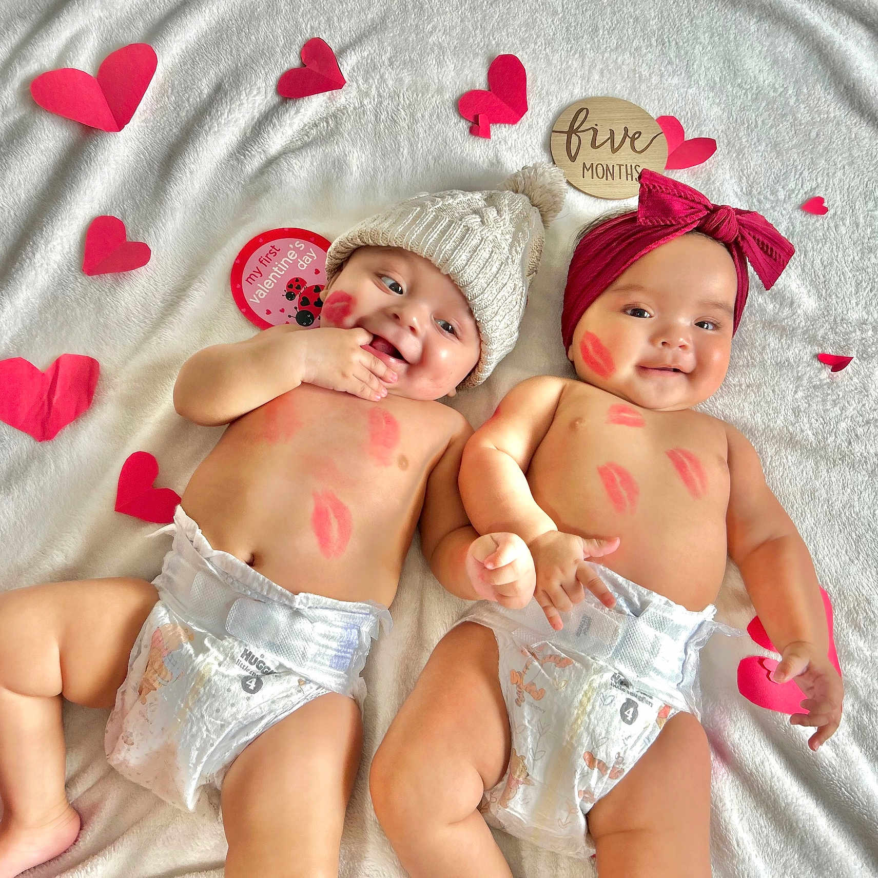 Kaelo Y Kate is registered to the contest to win money with this photo: baby, bodypart, bonnet, cap, clothing, diaper, face, finger, glove, hand, happy, hat, head, newborn, person, photography, portrait, shorts, smile, swimwear