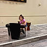 Nataly joined the competition — help win amazing prizes! bongos, child, concentration, drums, floor, girl, indoors, keyboard, music, musical_instrument, performing, piano, portrait, sign, sitting, stage, standing, toddler, wall, wood_floor
